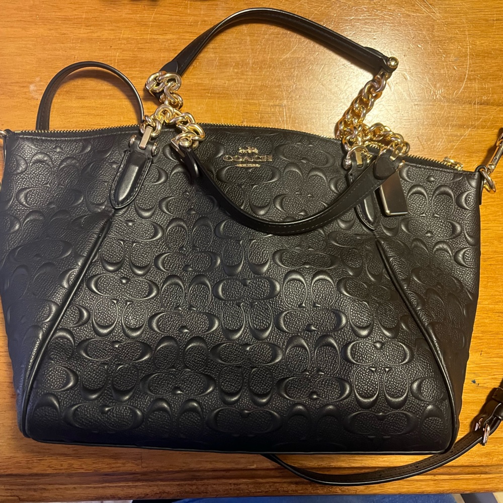 Coach bag. One slight blemish on the bottom (see picture)